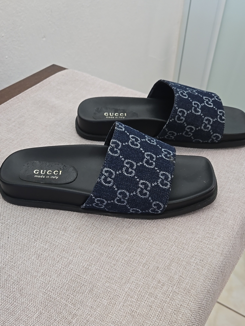 Gucci Navy Blue Monogram Slide Sandals.  I cannot determine its authenticity.